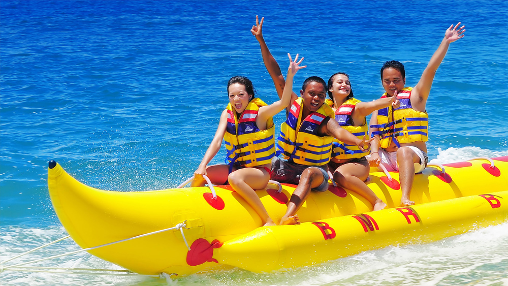 image of family on a banana boat